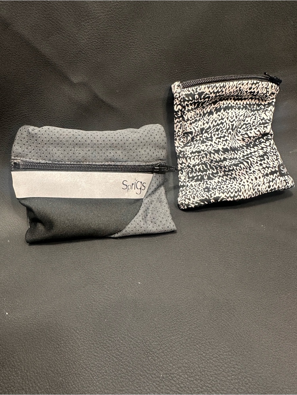 Sprigs Gray Foldable Running Wrist Pouch & Black White Patterned Pouch